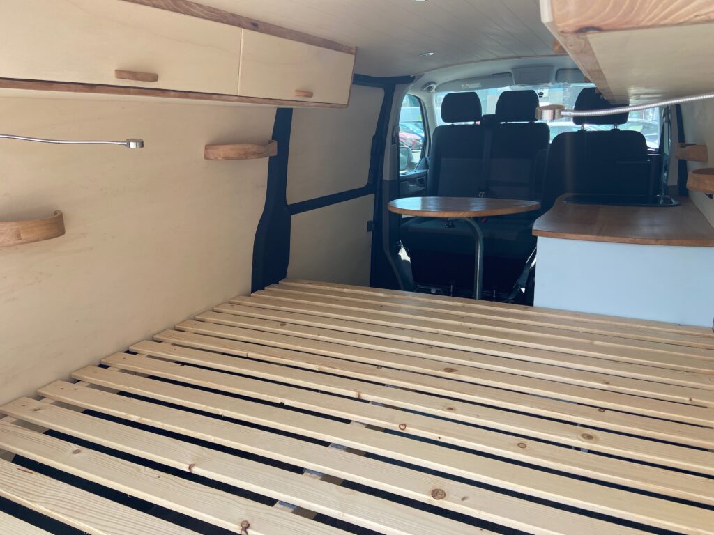 the back of our 2026 VW Transporter T6.1 bespoke Unfollow campervan conversion