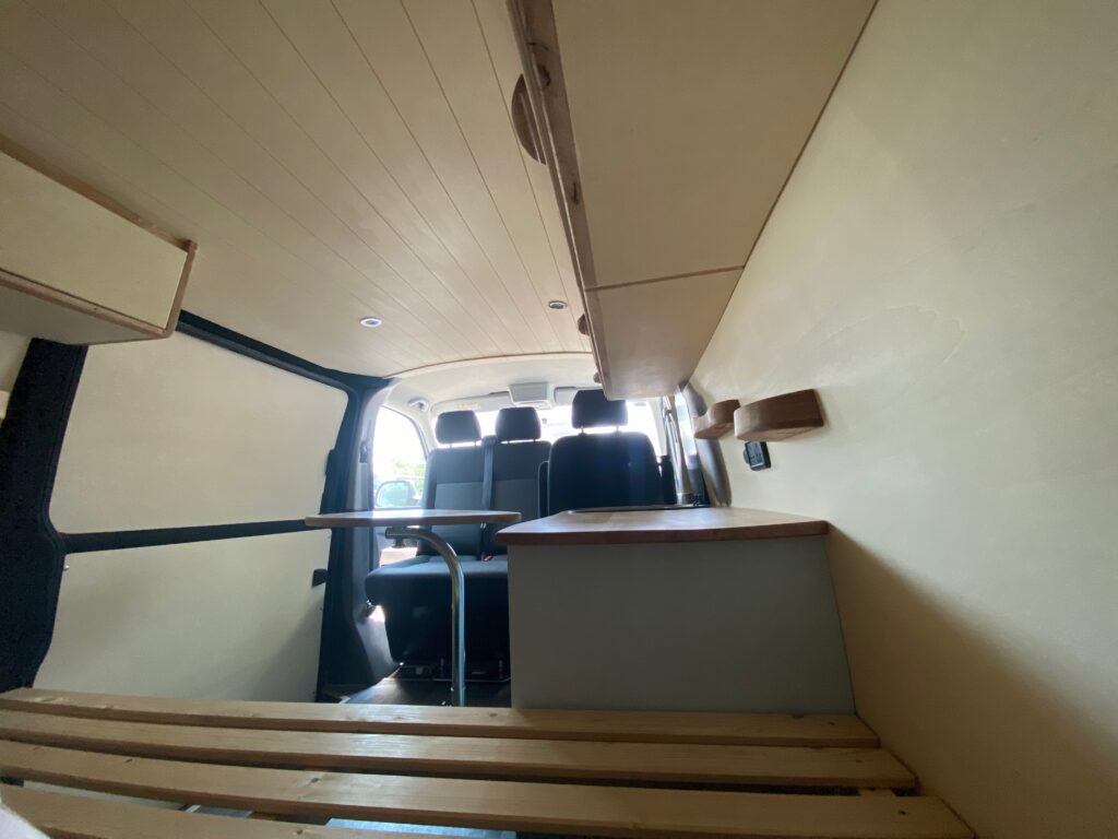 a view back to front of our 2026 VW Transporter T6.1 bespoke Unfollow campervan conversion